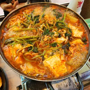 중앙탑초가집 사진