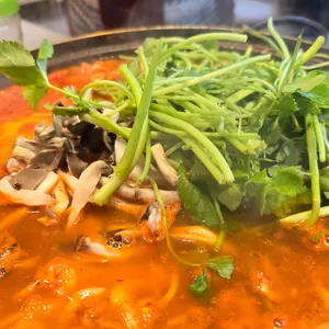 중앙탑초가집 사진