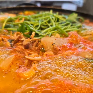중앙탑초가집 사진