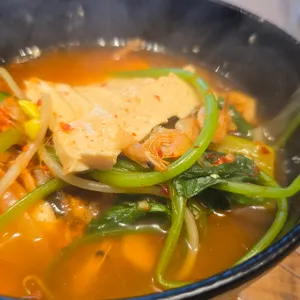 중앙탑초가집 사진