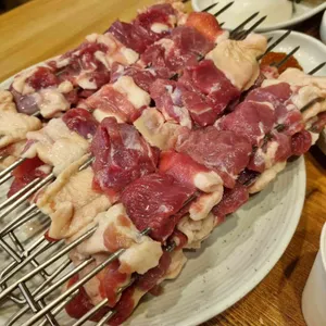 양주골 숯불 회전오리 사진