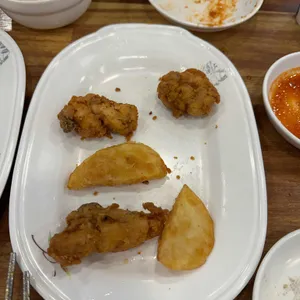 뉴숯불통닭 사진