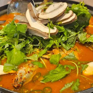 중앙탑초가집 사진