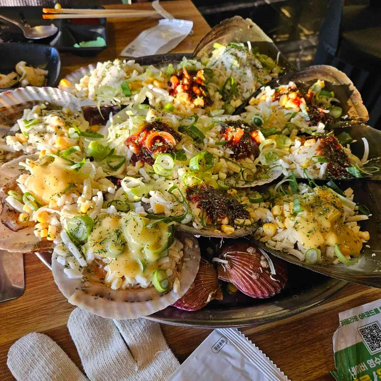 조개까는남자 사진