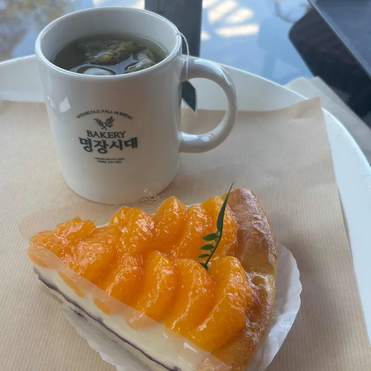 명장시대 사진